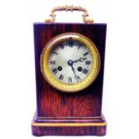 A 19th Century rosewood cased carriage style table clock with gilt metal handle and bezel to