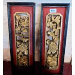 A pair of old Chinese carved wood and painted panels