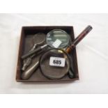 A small collection of vintage magnifying lenses including faux tortoiseshell, agate handled, etc.