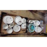 Two boxes containing a quantity of Royal Doulton Tumbling Leaves pattern tea and dinner ware, also
