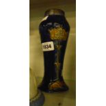 A Doulton Lambeth stoneware vase with Art Nouveau decoration and silver collar