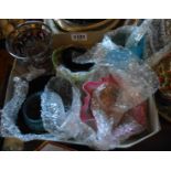 A box containing assorted coloured glassware, including Bohemian flash cut and engraved tumbler a/f,
