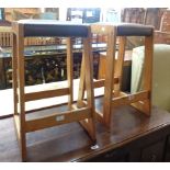 A pair of late 20th Century pine and leatherette bar stools