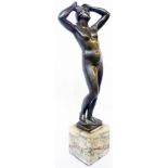 Cartinet: a 19th Century French brown patinated cast bronze figure of a nude maiden, bearing cast