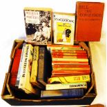 A box containing a selection hard back and paper back P.G. Wodehouse titles - various age and
