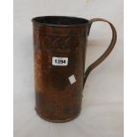 An Arts and Crafts movement beaten copper tall cylindrical mug decorated with a band of repousse