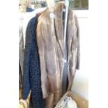 A vintage Astra Furs (Paris) black lamb's wool jacket with fur collar - sold with a fur coat