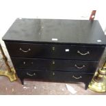 An 81cm retro stained wood chest of three long drawers, set on tapered legs - one handle missing