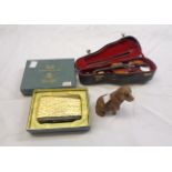 A cased miniature violin - sold with a boxed vintage lighter and a carved wooden dog figure