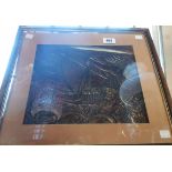 An Arts & Crafts movement embossed copper panel depicting a galleon amidst stormy seas