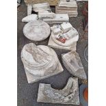 A selection of stone pillar bases and mouldings, etc.