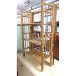 A 52cm late Victorian bamboo three shelf folding bookcase