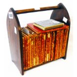 A small mahogany mitre shaped travelling bookcase containing leather bound books by Alfred Tennyson,