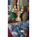 A selection of collectable items including old ink and paints, decorative resin candelabra, tins,
