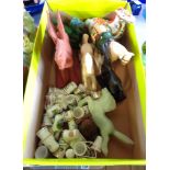 A small box containing assorted collectable thimbles and horse figurine models