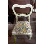 A Victorian balloon back chair with later painted finish and upholstery