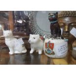 Three crested china cat models