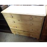 A 1.02m antique pine chest of two short and three long graduated drawers, set on later turned feet