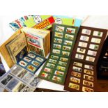 Three albums containing assorted sets and part sets of cigarette cards - sold with other cards, an