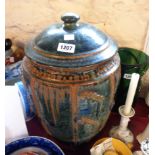 A large studio pottery lidded bread crock decorated with applied wheat sheafs and a tenmoku glaze