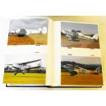 A album containing a collection of modern photographs of civilian and military aircraft, ships and