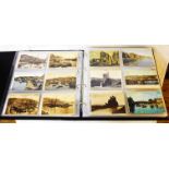 A large red ring bound album containing a collection of 300+ early and later 20th Century postcards,