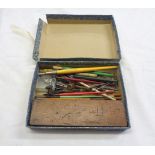 A small box containing assorted vintage drawing instruments and dip pens