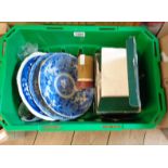 A crate containing assorted pottery and collectable items including blue and white plates, etc.