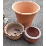 Three garden pots comprising one large terracotta, small salt glaze stoneware and another