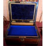 A 19th Century rosewood and brass inlaid jewellery box with part fitted interior and sprung