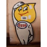 A modern reproduction painted cast iron cut out Esso Man sign
