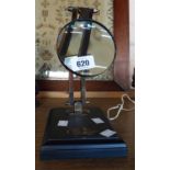 A modern adjustable table magnifier