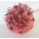 A vintage Woolsand pink feathered hat