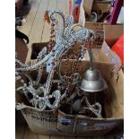 A box containing a pair of modern decorative hanging lamp fittings of cage chandelier form with