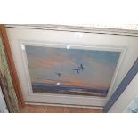 Peter Scott: a framed vintage pencil signed coloured print, depicting ducks in flights a dusk -