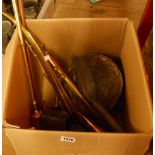 A box containing assorted metalware including copper kettle, hunting horns, pewter measures, etc.