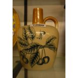 A late 19th Century stoneware whiskey flask with printed decoration, made by Port- Dundas of