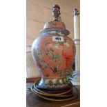 A 20th Century Chinese porcelain lamp of temple jar form with carved hardwood base - a/f