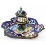 A late 19th Century champleve enamel inkwell with hinged lid and shaped tray