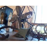 An old desk fan with brass cage and fan - sold with an old servant's bell