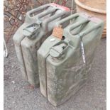 Two large green painted metal jerry cans - late 20th Century