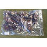 A bag containing twenty six antique and vintage door lock escutcheon covers