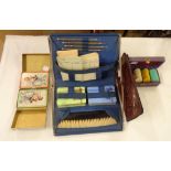 A vintage bridge set in folding case including school cards, pencil, table brush, etc. - sold with a
