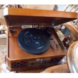 A modern record/CD/cassette/radio unit in retro wooden case