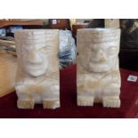 A pair of onyx figural bookends