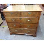 A 100cm 18th Century walnut and cross banded chest of two short and three long graduated drawers,