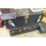 Two similar approximately 90cm wide vintage travelling trunks with metal bound corners