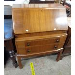 A 74cm 1930's walnut bureau with fitted interior and associated silver mounted blotting pad over two