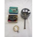 A vintage Smiths car dashboard clock - sold with a boxed lensatic compass and another pocket