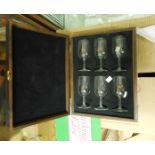 A set of six mid 20th Century Remy Martin cognac glasses in fitted wooden case